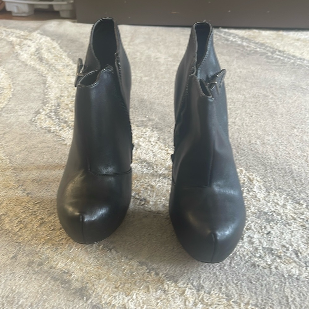 Black booties by ALDO. Size 9.